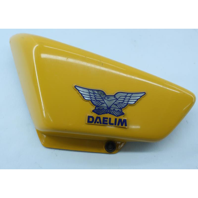 Demi flanc de selle gauche DAELIM VT 125 1999 à 2004